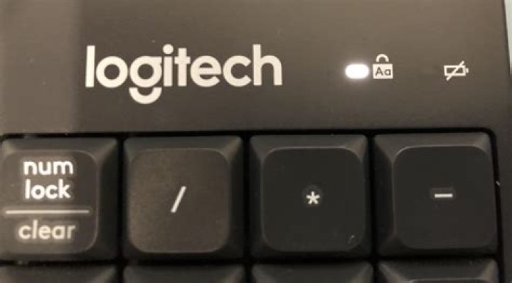 caps lock stuck on when using logitech external keyboard