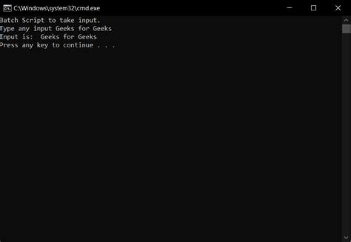 Force output to console in a batch script with output redirected to a file