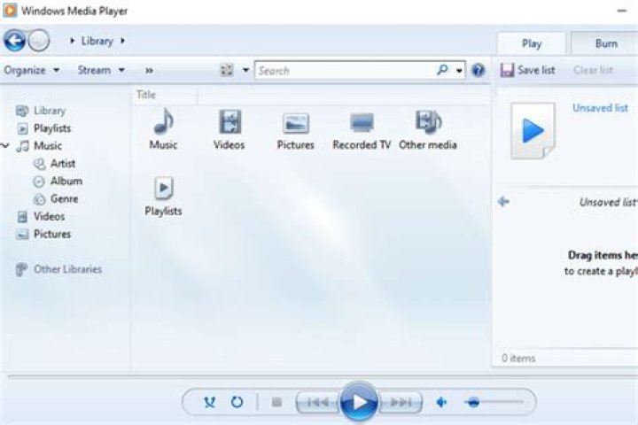 How can I configure Windows Media Player to manage my music library?