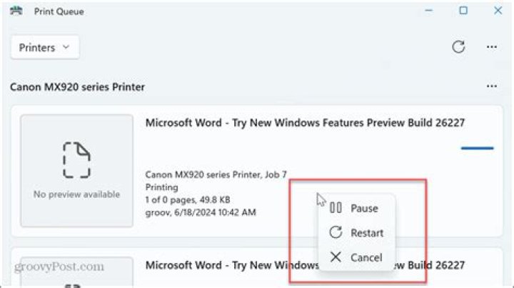 Is there a way to pause current print job and start printing another document in windows 10?