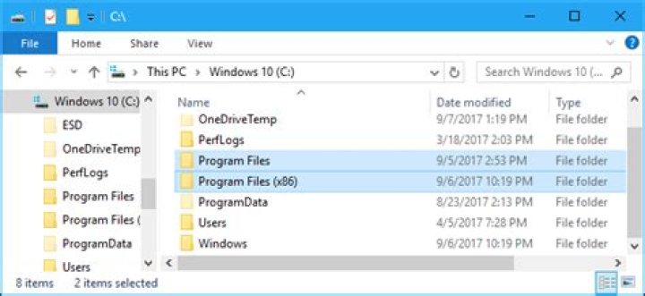 Why are certain 64 bit applications installed by default on the Program Files (x86) folder
