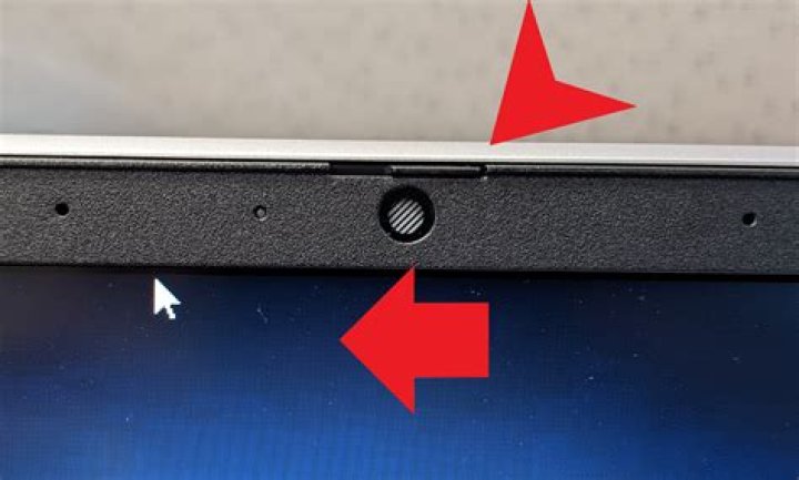 Why is my laptop's webcam light flashing on and off, sporadically?