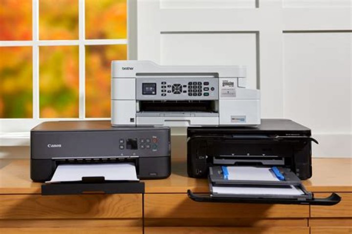 Why shouldn't I attach laser printers or scanners to a UPS?